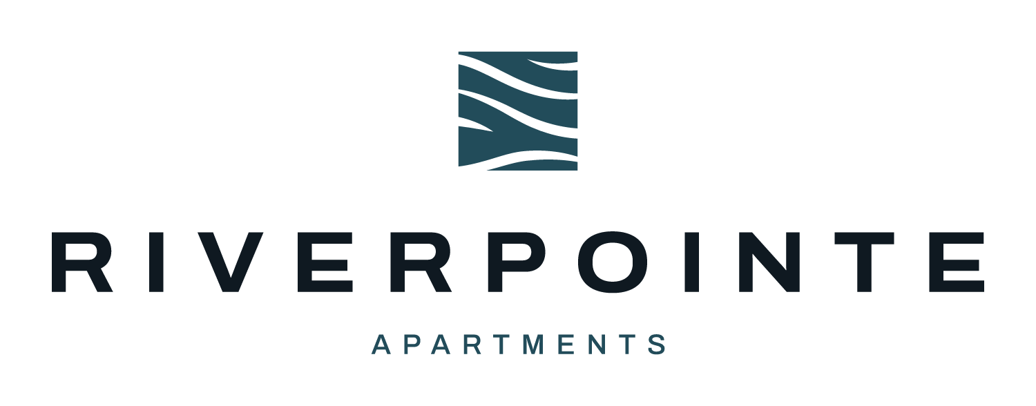 a logo for riverpoint apartments with a green background and the word riverpoint